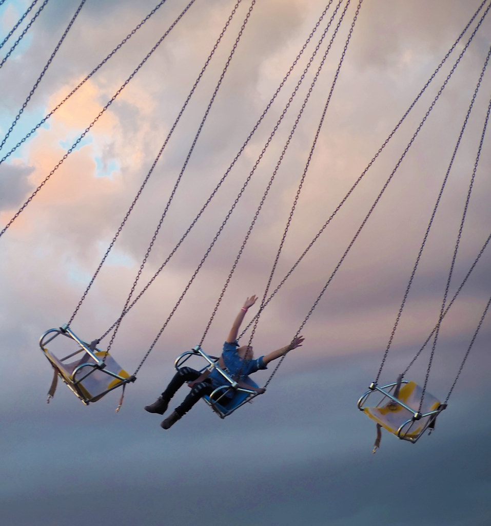 County fair carnival with mechanical entertainment attractions